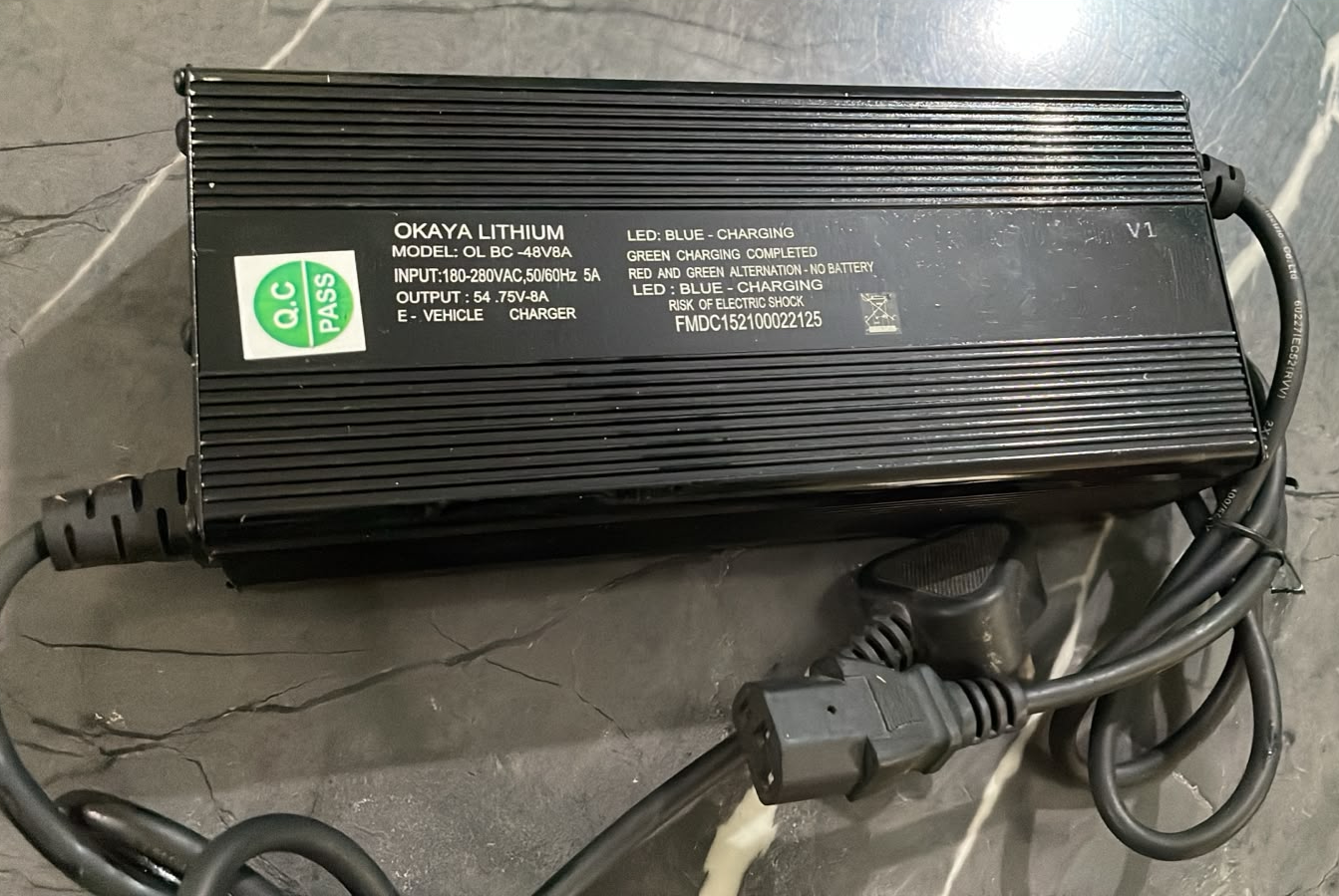 Okaya Lithium OLBC-48V8A Charger Label – Input 180-280V AC 50/60Hz 5A Output 54.75V 8A with IEC Connector – EV2W