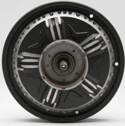 Close-up of a mechanical component, possibly a clutch or brake assembly, on a tiled floor.