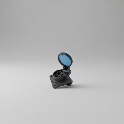 Hand holding a black electrical connector against a neutral background