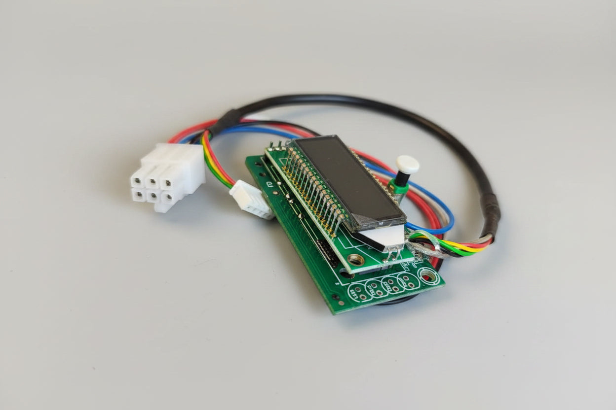 Electronic circuit board with connectors on a red fabric background