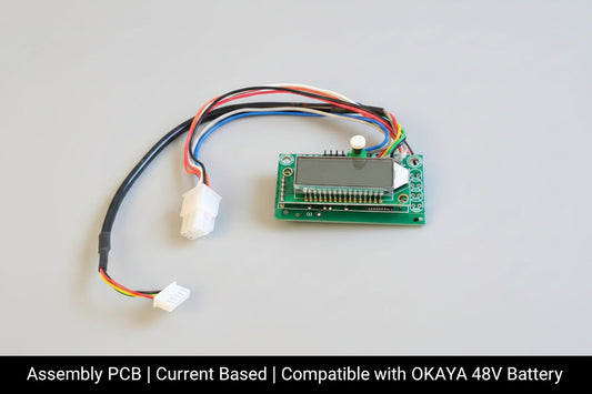 Electronic circuit board with wires on a red fabric background