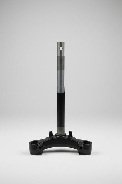 Metal stand or support structure on a tiled floor with wooden panel background