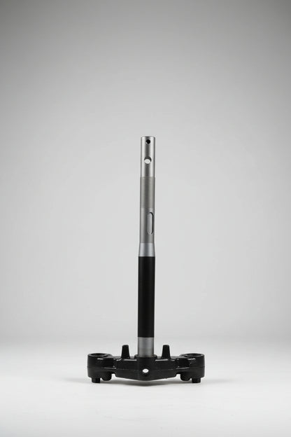 Black metal pipe on a tiled floor