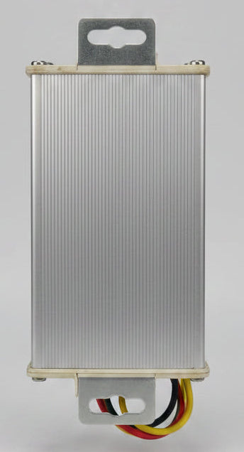 Rectangular metallic light fixture on a wooden surface
