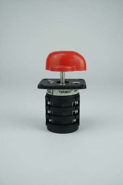 A Tekmec 15A 48VDC push-button relay module with a red dome-shaped top and a black cylindrical body, shown on a textured red background.