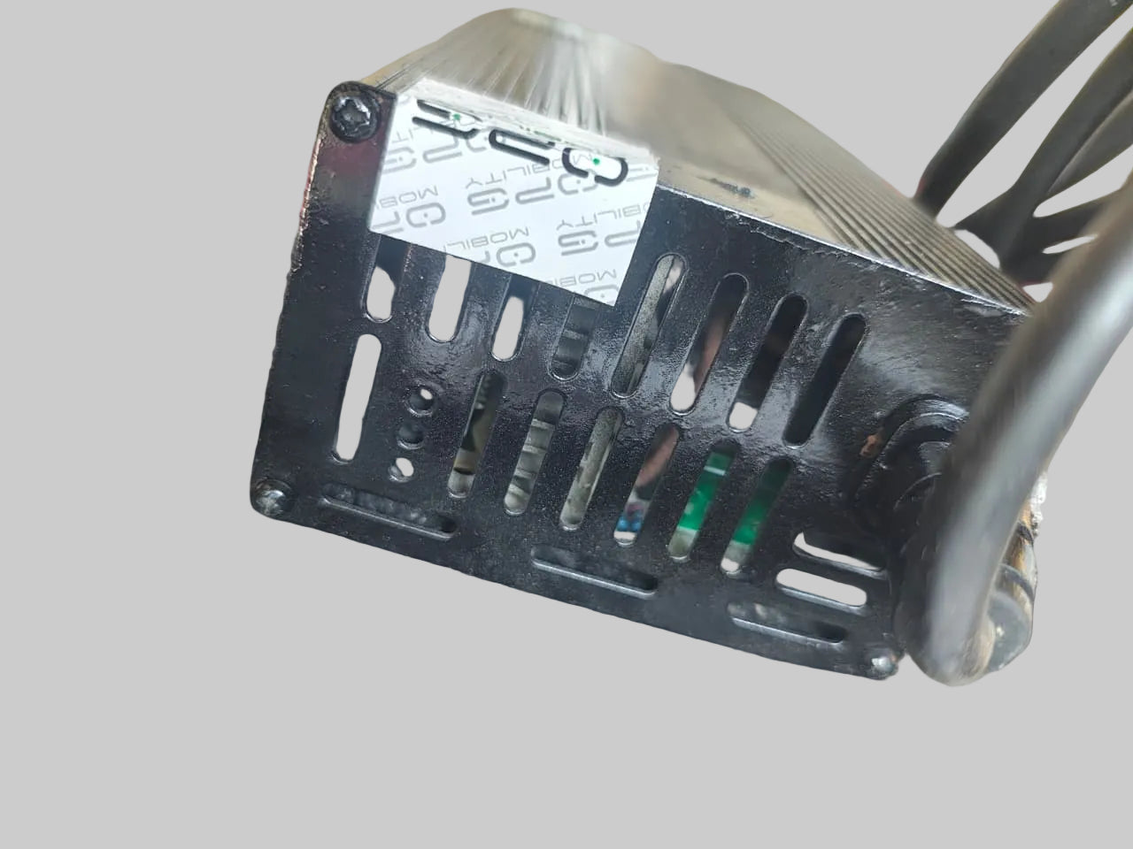 Black electronic power supply unit on a textured surface