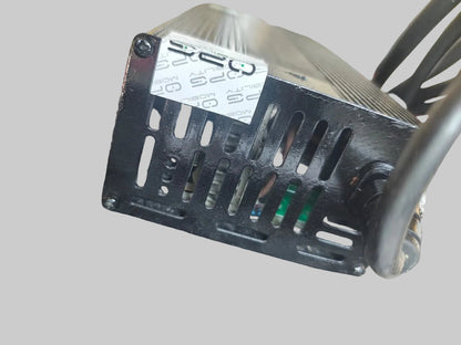 Black electronic power supply unit on a textured surface