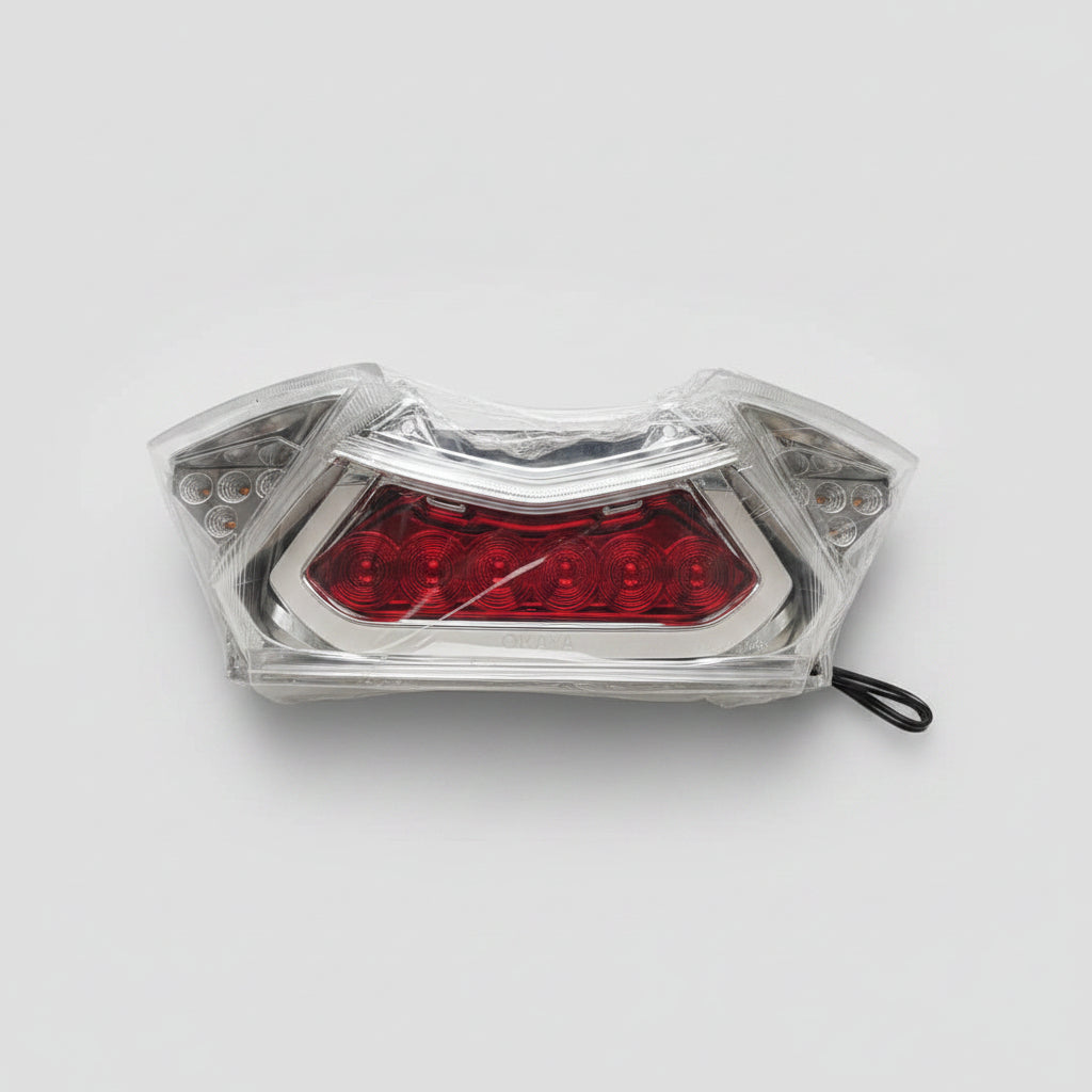 Clear plastic container with red contents on a light-colored floor.