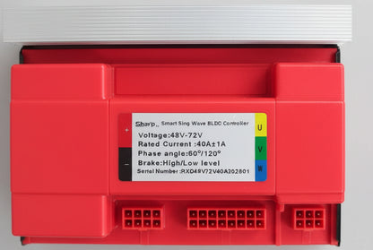 A red industrial electronic module with a white label reading 'Eaton Smart Busway BLC Controller' and a stack of white terminal strips placed beside it on a dark surface.